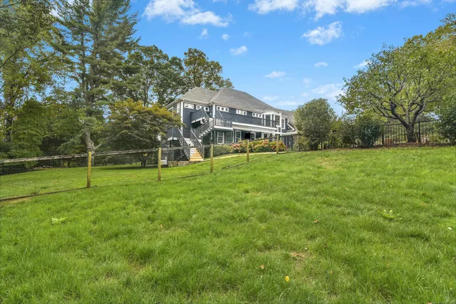 a view of a house with a big yard