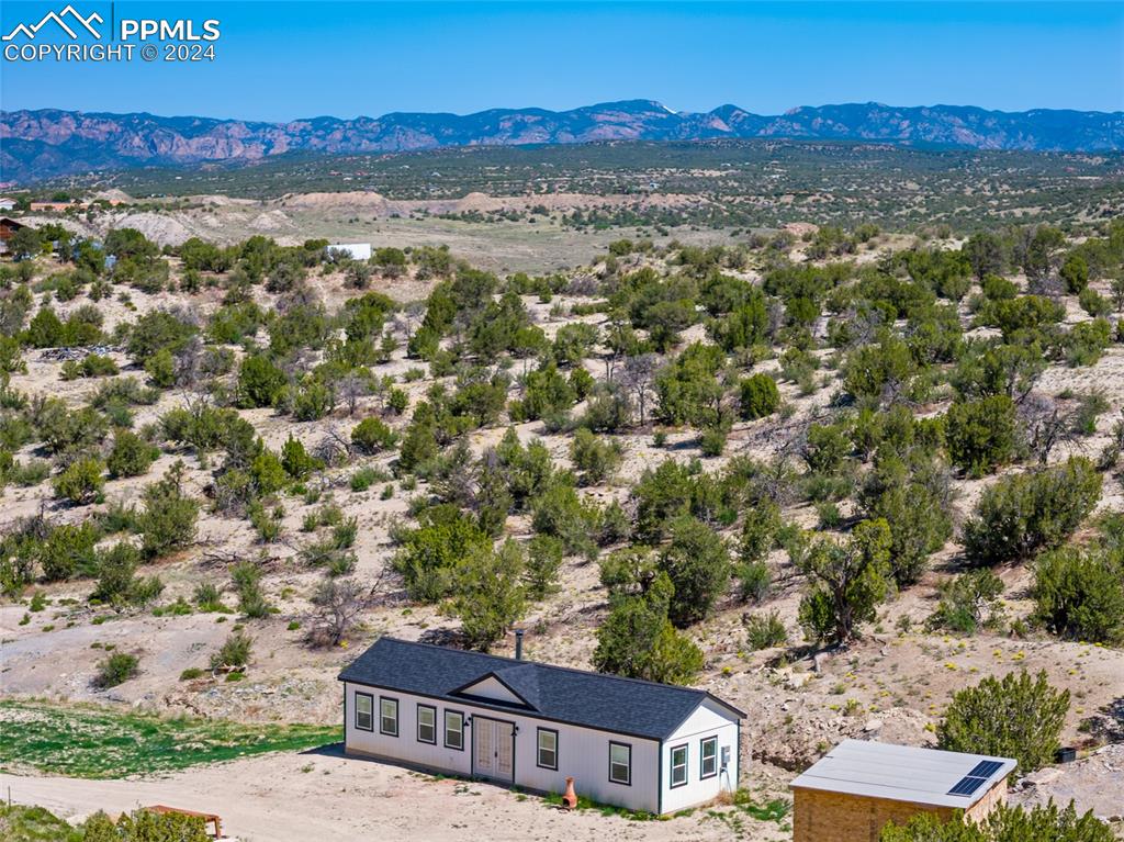 659 Turrell Trail Penrose, CO 81240 - Photo 14 of 19 an aerial view of residential houses with outdoor space