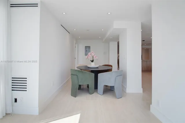 a room with furniture and a potted plant