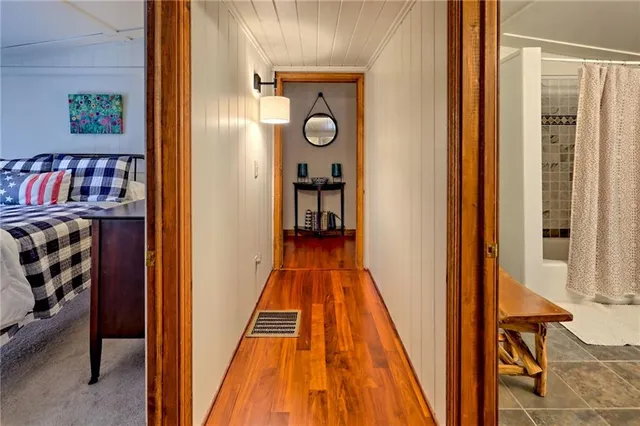 a front view of a house with wooden floor