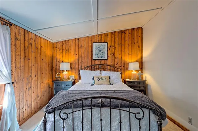 a bathroom with sink toilet and shower