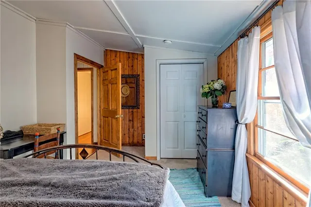 a bathroom with a toilet and shower