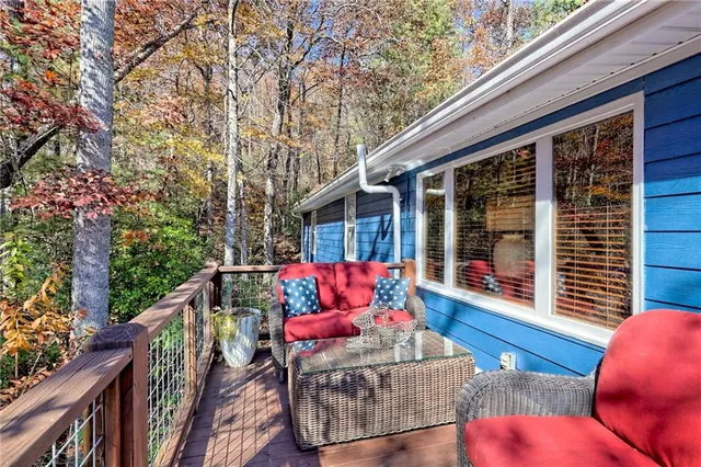 a view of a brick wall next to a building