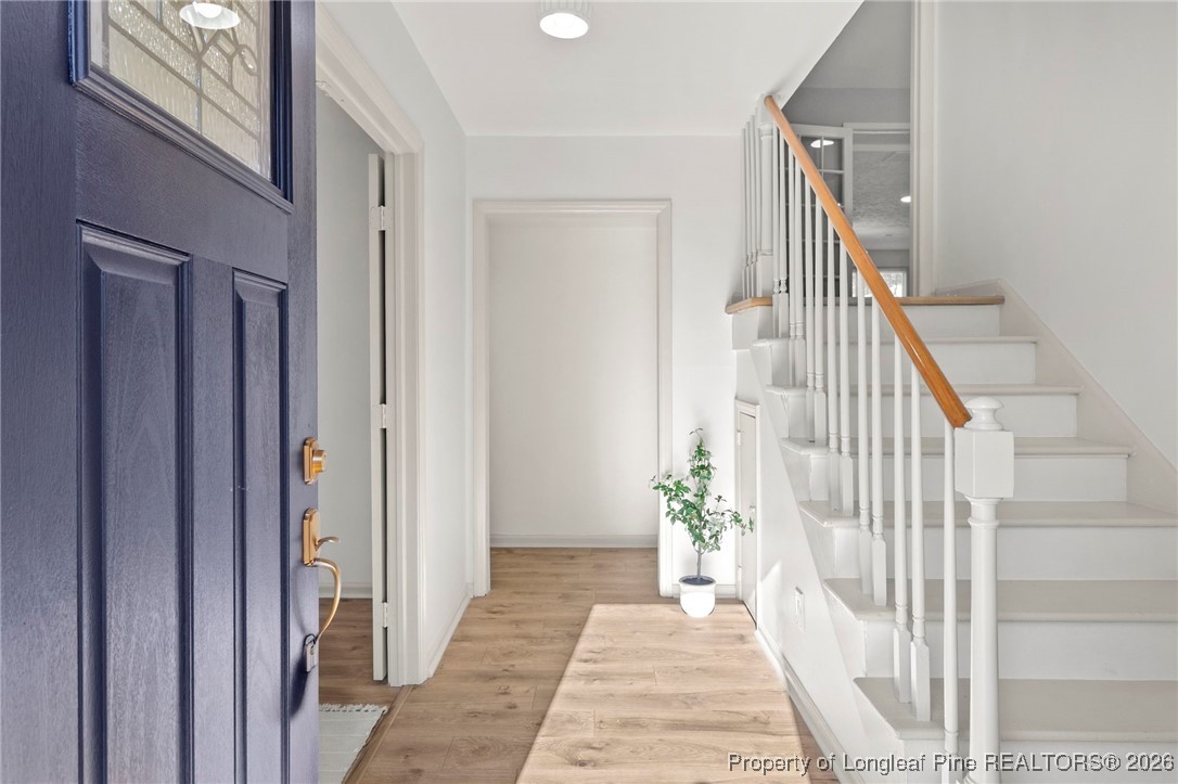 5434 Hampton Road Fayetteville, NC 28311 - Photo 1 of 45 a view of a hallway with wooden floor and entryway