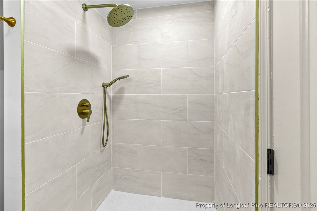 5434 Hampton Road Fayetteville, NC 28311 - Photo 12 of 45 a bathroom with a shower