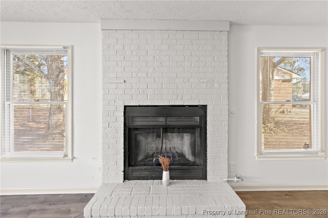 5434 Hampton Road Fayetteville, NC 28311 - Photo 24 of 45 a bedroom with a bed and wooden floor