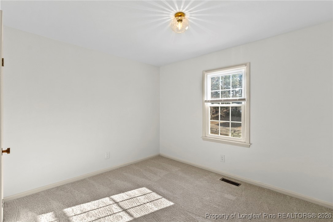 5434 Hampton Road Fayetteville, NC 28311 - Photo 34 of 45 an empty room with a window
