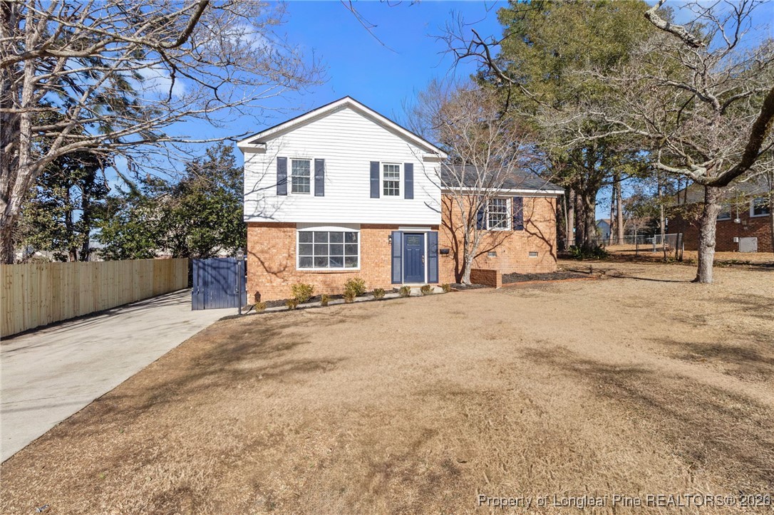5434 Hampton Road Fayetteville, NC 28311 - Photo 4 of 45 a view of a house with a yard
