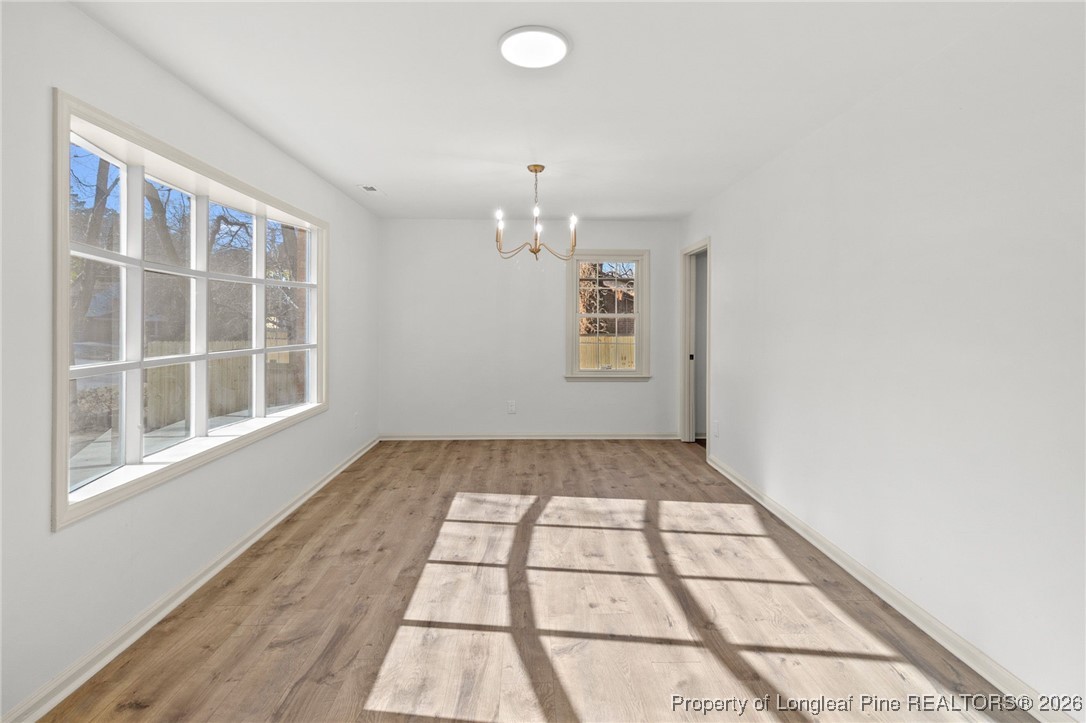 5434 Hampton Road Fayetteville, NC 28311 - Photo 8 of 45 a view of an empty room and window
