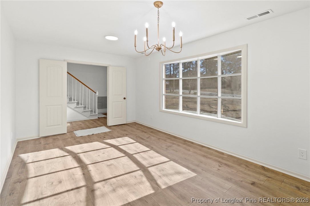 5434 Hampton Road Fayetteville, NC 28311 - Photo 9 of 45 a view of an empty room with a window