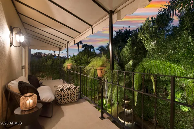 a view of balcony with furniture