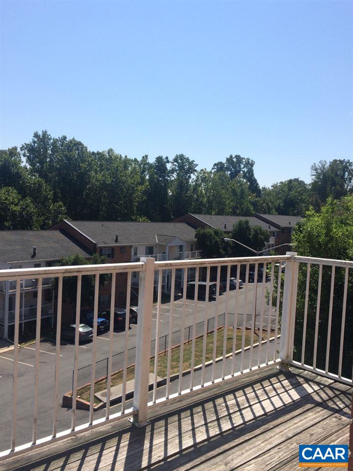 2691 Barracks Road, Unit 10 Charlottesville, VA 22901 - Photo 7 of 10 a view of a house with a roof deck