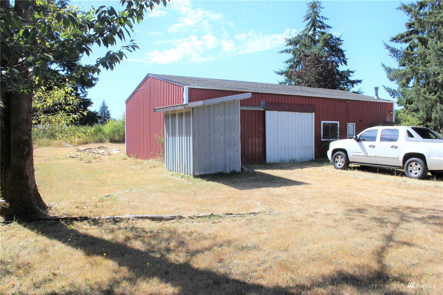17739 Pendleton Street Southwest Rochester, WA 98579 - Photo 2 of 26 a view of a house with a yard