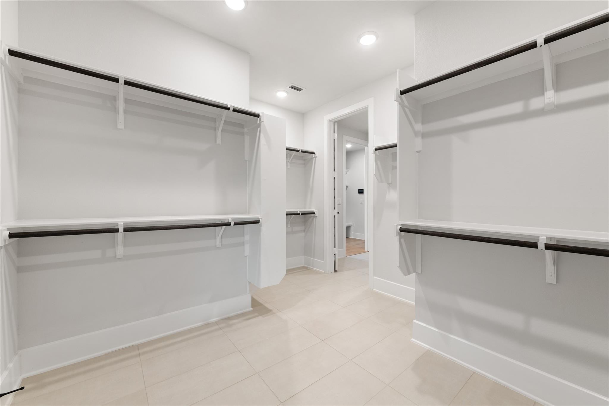 6216 Bower Well Road Austin, TX 78738 - Photo 20 of 31 a view of an empty walk in closet