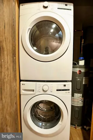 a utility room with dryer and washer