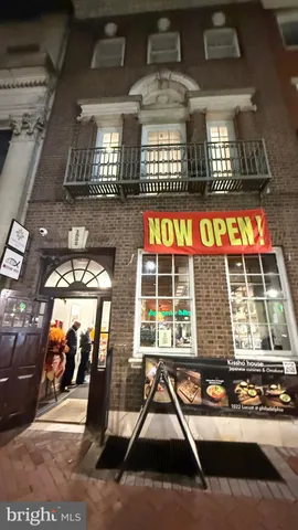 a view of a building with sitting area