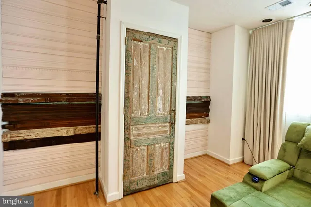 a view of a living room and entryway