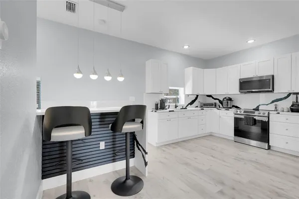 $894,000 | 223 North Peninsula Drive, Unit A & B, Daytona Beach, FL 32118