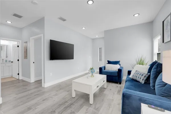 a view of kitchen and dining area with furniture