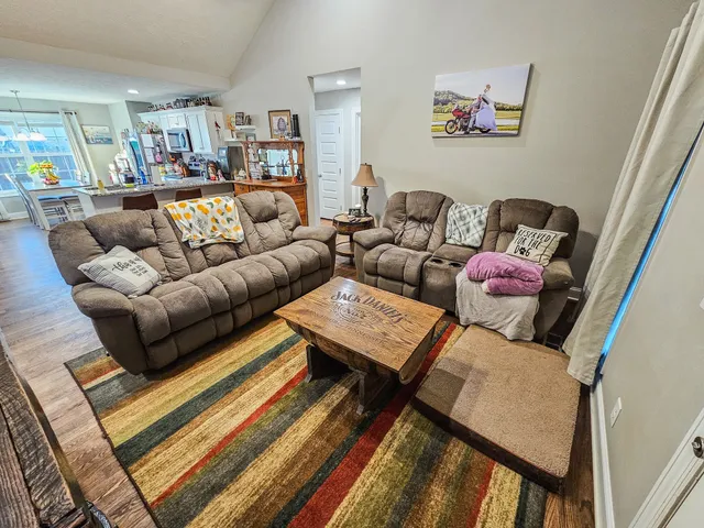 a room with a bed and a mirror