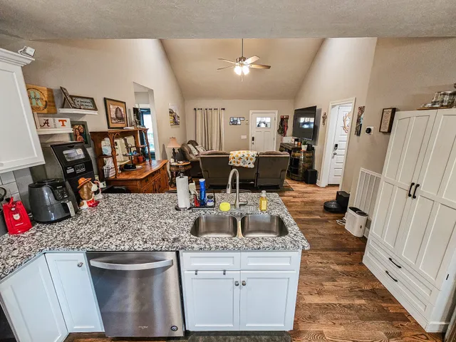 a view of a kitchen and dining room