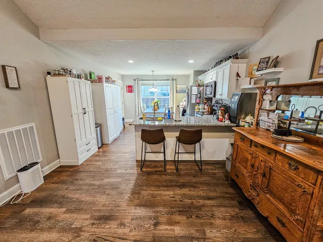 a living room with furniture and a couch