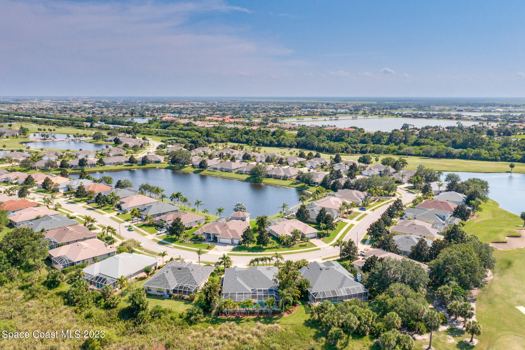 4481 Aberdeen Circle Rockledge, FL 32955 - Photo 55 of 70 an aerial view of a city with lots of residential buildings