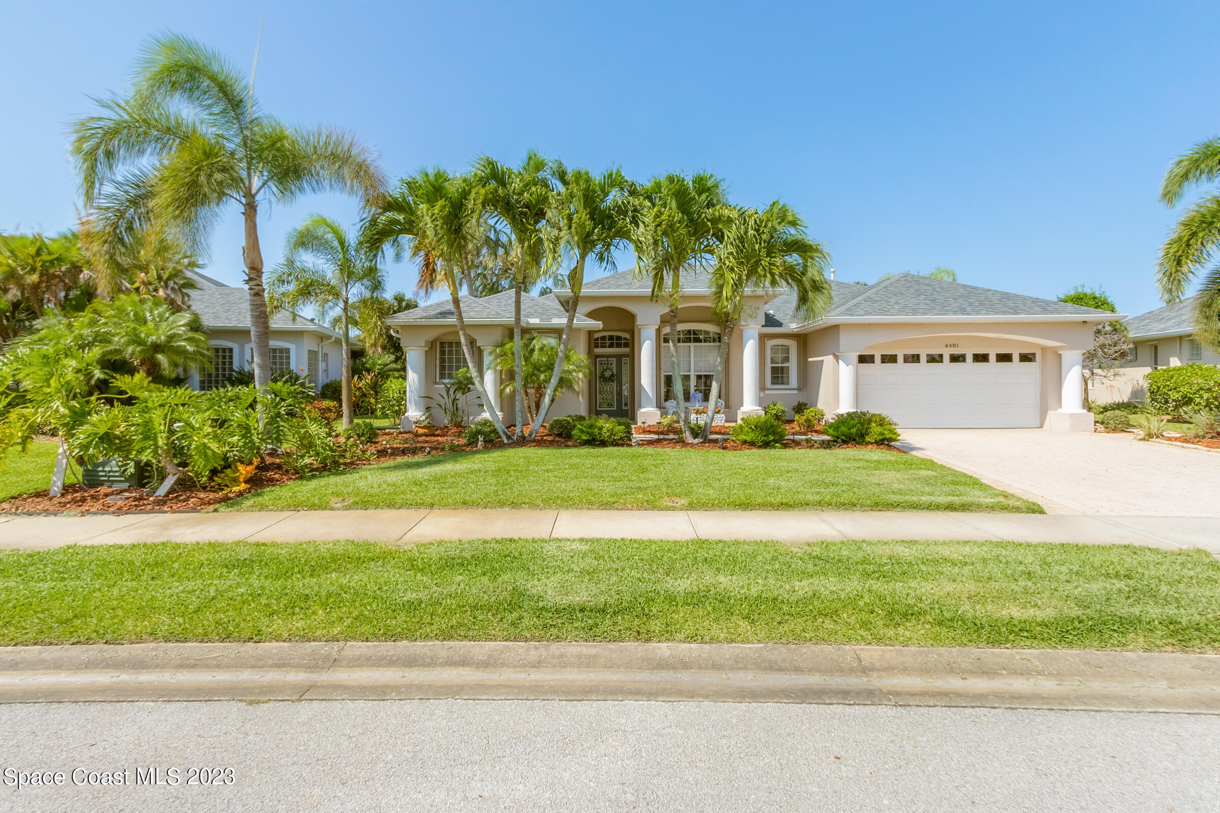 4481 Aberdeen Circle Rockledge, FL 32955 - Photo 70 of 70 a front view of multi story residential apartment building with yard and green space