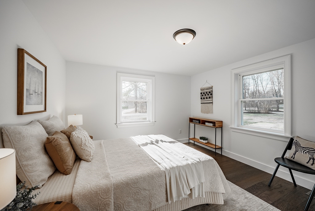 41 Leverett Road Amherst, MA 01002 - Photo 14 of 27 a bedroom with a bed and a window
