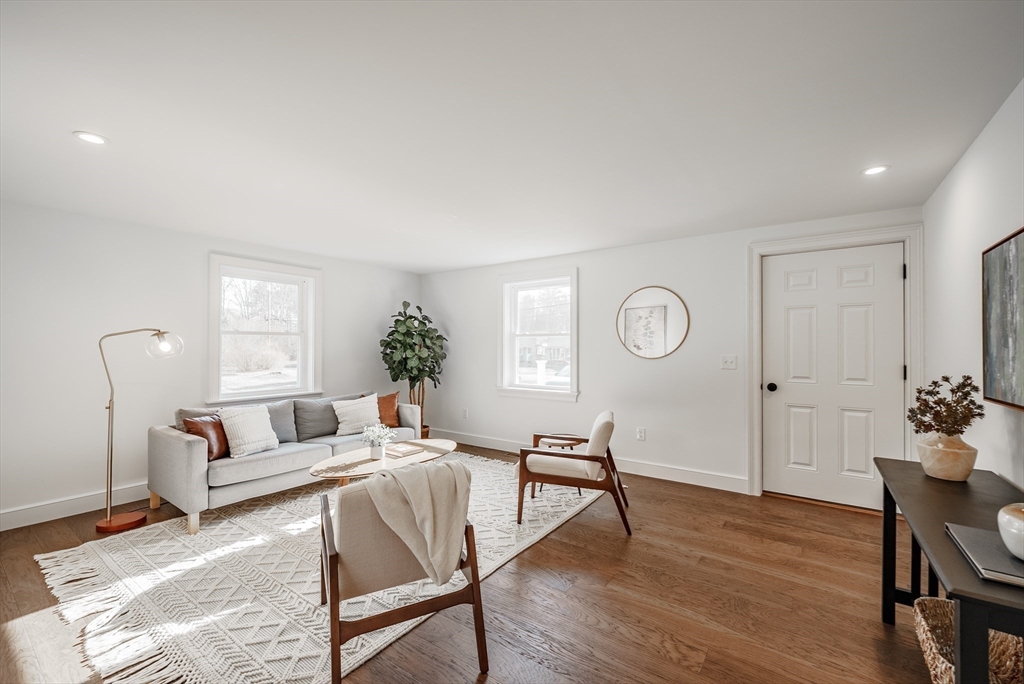 41 Leverett Road Amherst, MA 01002 - Photo 9 of 27 a living room with furniture a window and wooden floor