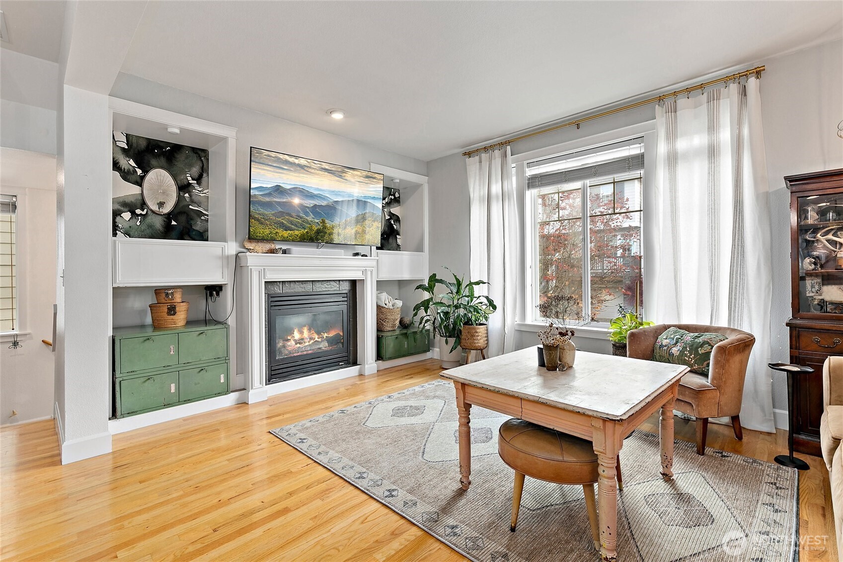 137 Maple Street Tacoma, WA 98466 - Photo 5 of 39 a living room with furniture and a fireplace