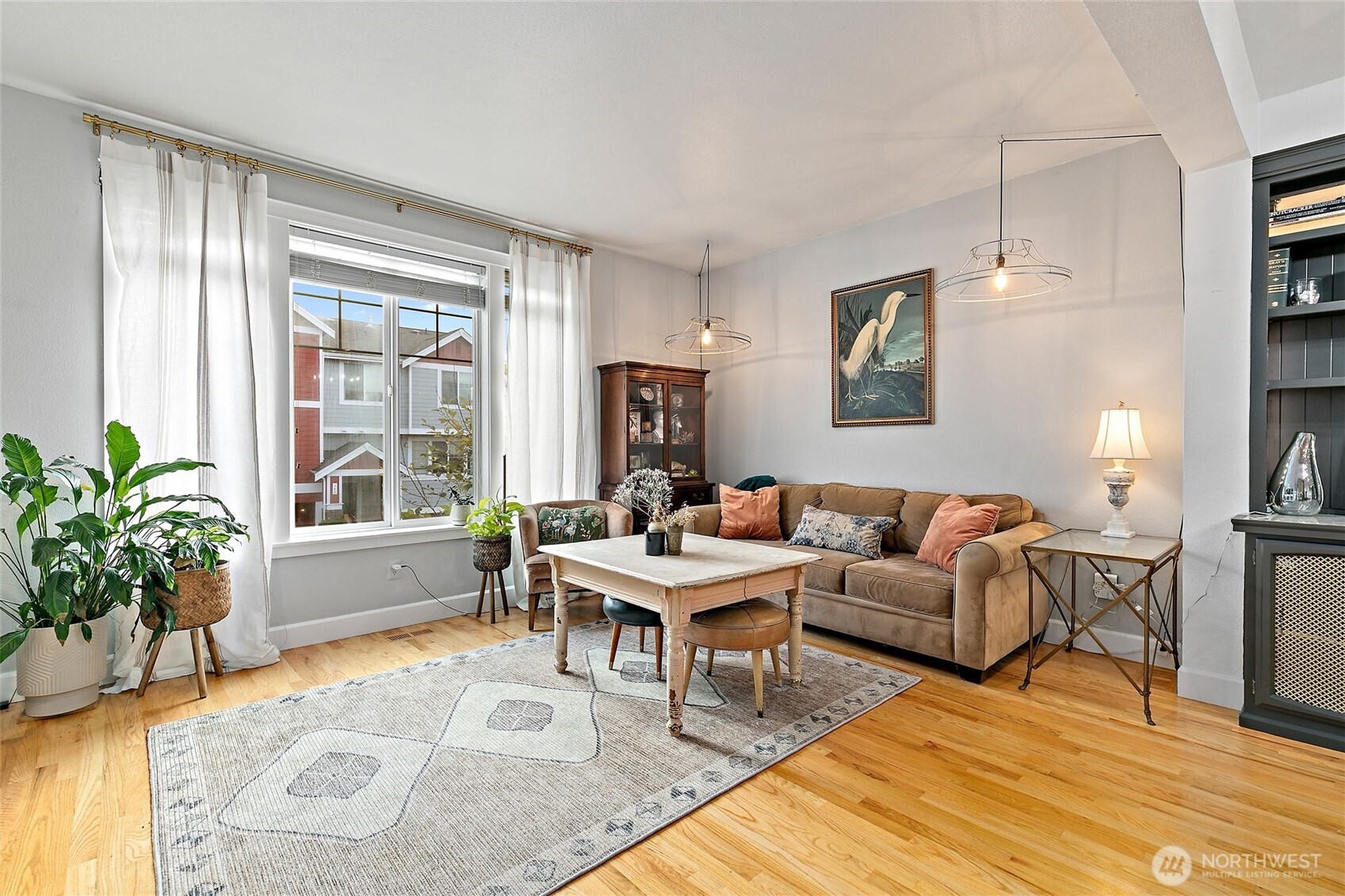 137 Maple Street Tacoma, WA 98466 - Photo 6 of 39 a living room with furniture and wooden floor