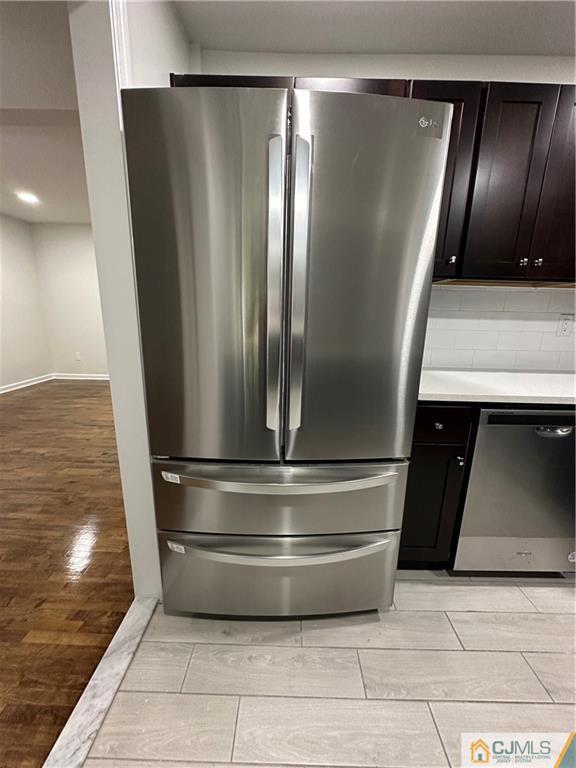 4202 Hana Road Edison, NJ 08817 - Photo 22 of 44 a refrigerator freezer sitting inside of a kitchen