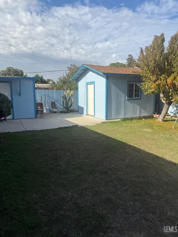 a house view with a garden space