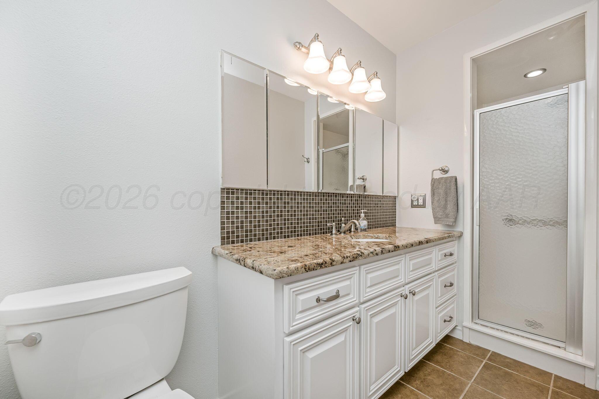 6010 Dreyfuss Road Amarillo, TX 79106 - Photo 15 of 21 Owners Bathroom
