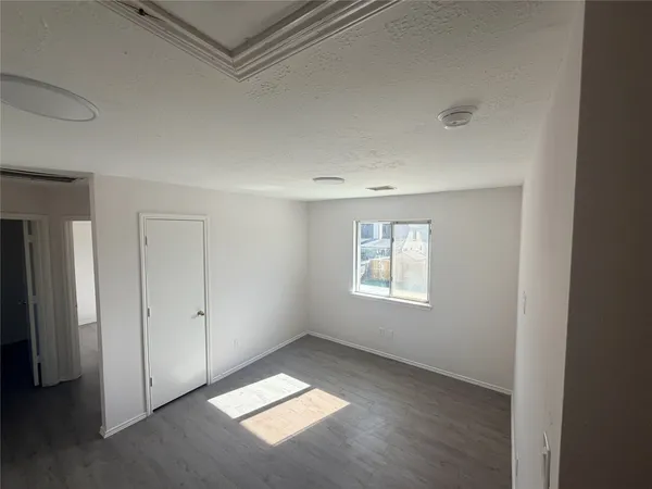 an empty room with windows