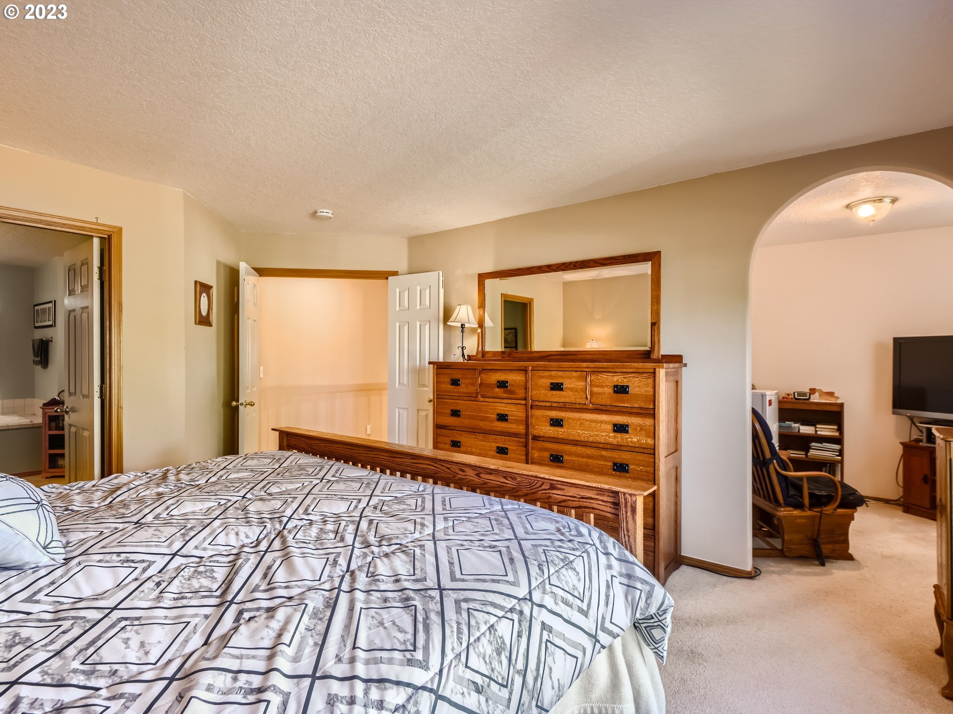 1167 Southeast Eagle Lane Gresham, OR 97080 - Photo 11 of 25 a bedroom with a bed and furniture