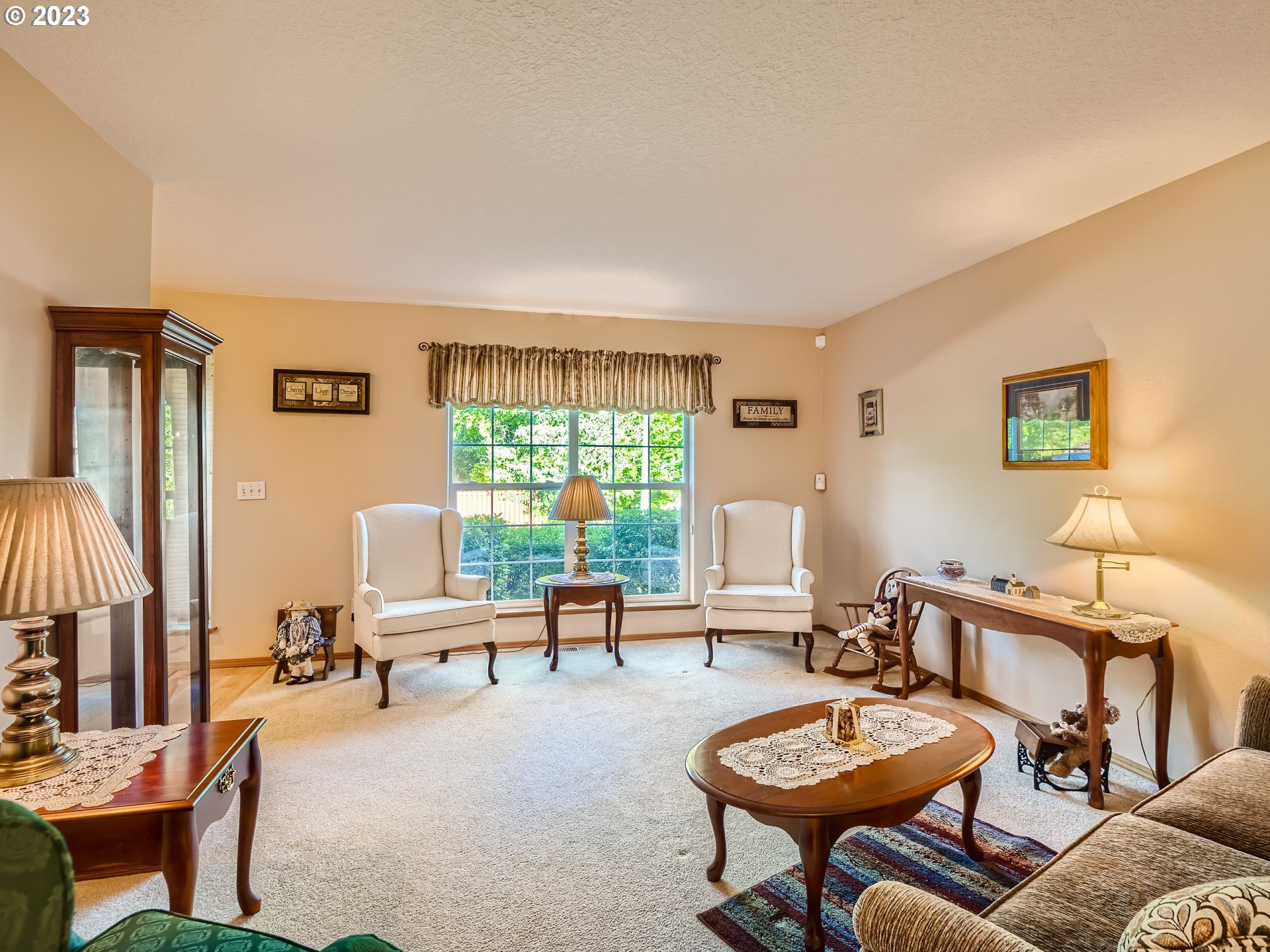 1167 Southeast Eagle Lane Gresham, OR 97080 - Photo 3 of 25 a living room with furniture and a large window
