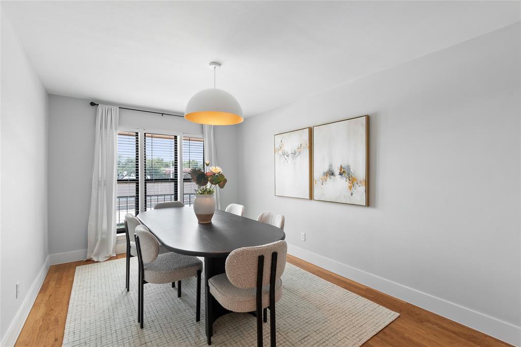 10727 Villager Road, Unit C Dallas, TX 75230 - Photo 11 of 39 Dining room with light wood finished floors and baseboards