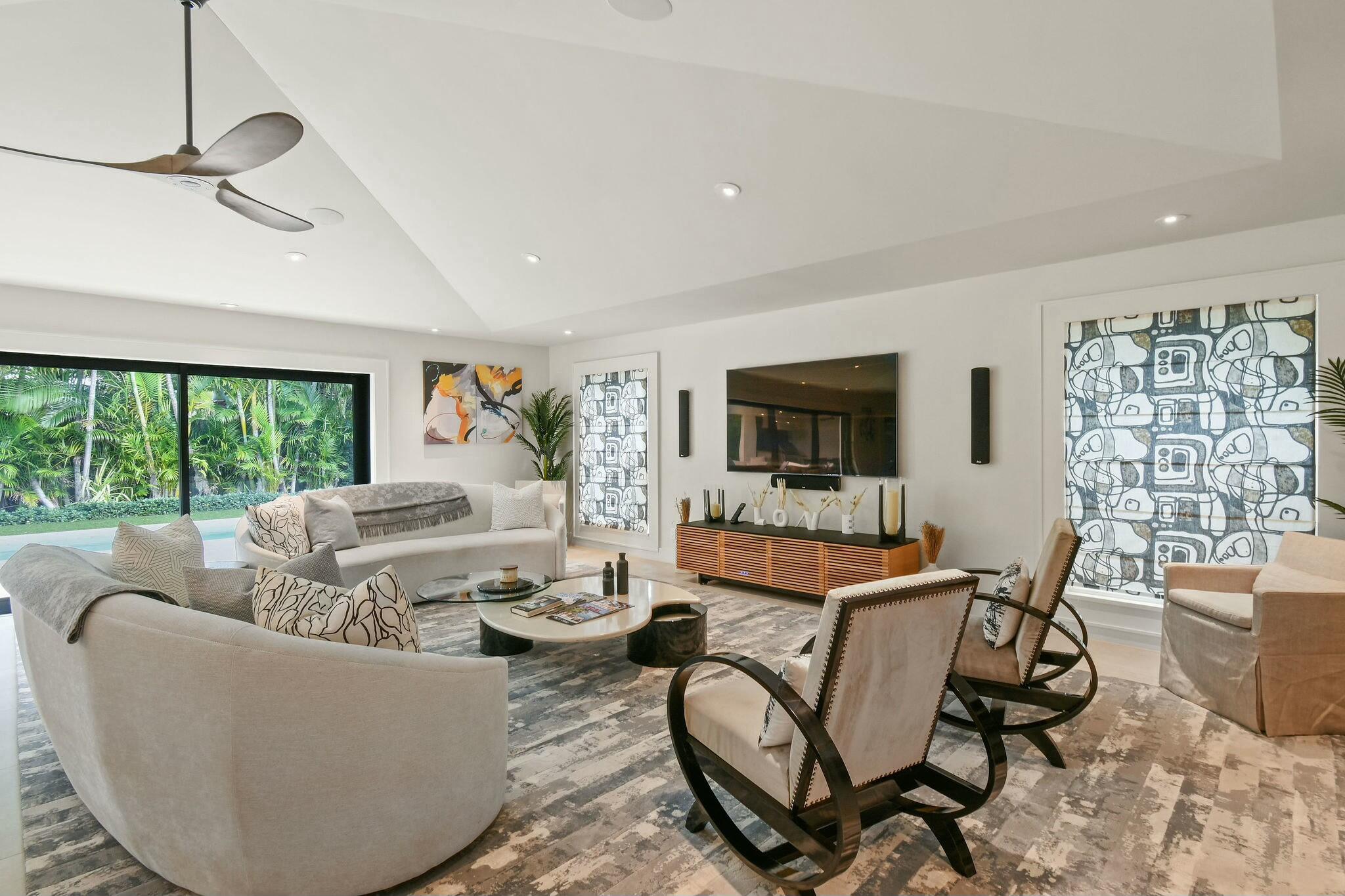 170 Beacon Lane Jupiter Inlet Colony, FL 33469 - Photo 7 of 46 a living room with furniture and a large window