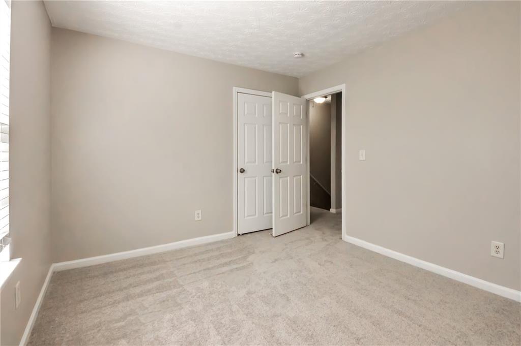 344 Springbottom Court Southeast Lawrenceville, GA 30046 - Photo 17 of 26 a view of an empty room