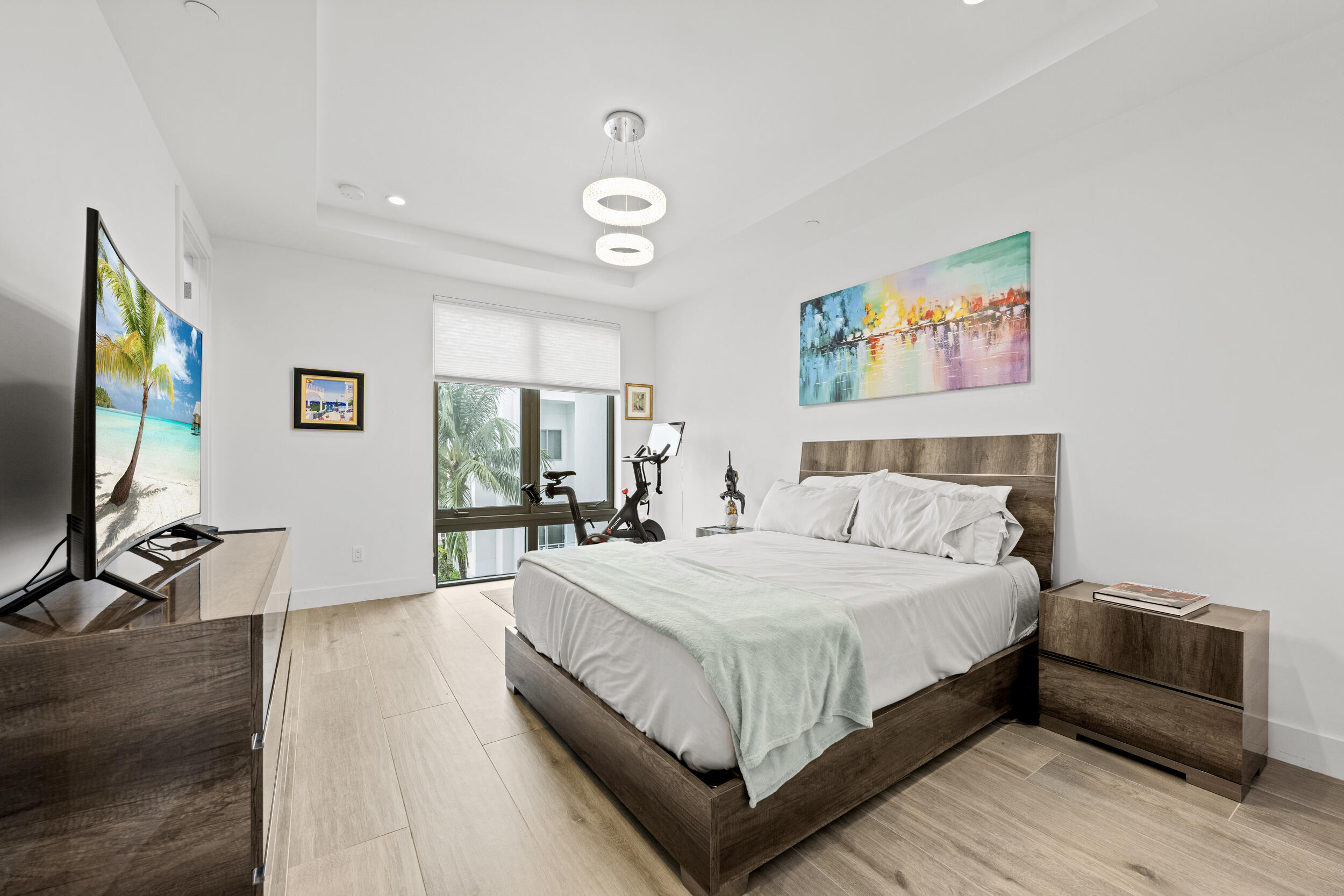 1811 Northwest 42nd Drive Boca Raton, FL 33431 - Photo 26 of 51 a bedroom with a bed and a flat screen tv
