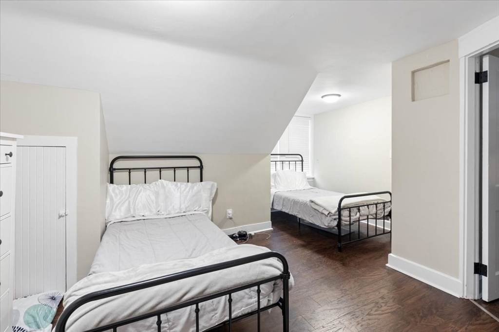 64 Parker Street Maynard, MA 01754 - Photo 19 of 39 a bedroom with two beds and window