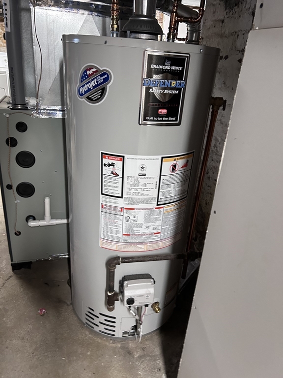 64 Parker Street Maynard, MA 01754 - Photo 34 of 39 a view of water heater room