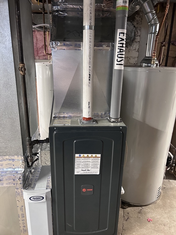 64 Parker Street Maynard, MA 01754 - Photo 35 of 39 a close view of water heater