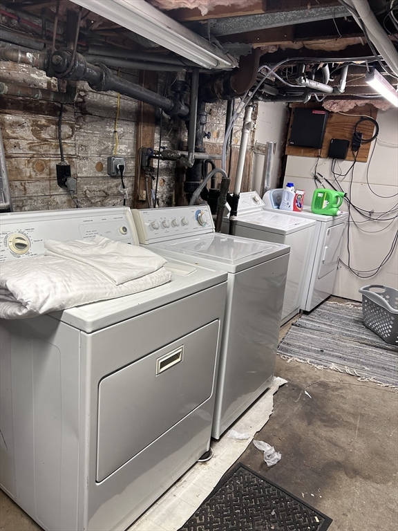 64 Parker Street Maynard, MA 01754 - Photo 37 of 39 a utility room with dryer and washer