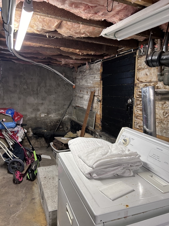 64 Parker Street Maynard, MA 01754 - Photo 39 of 39 a utility room with dryer and washer