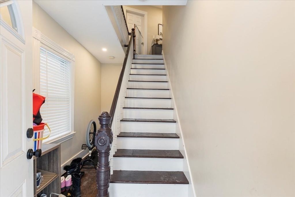 64 Parker Street Maynard, MA 01754 - Photo 9 of 39 a view of entryway with wooden floor