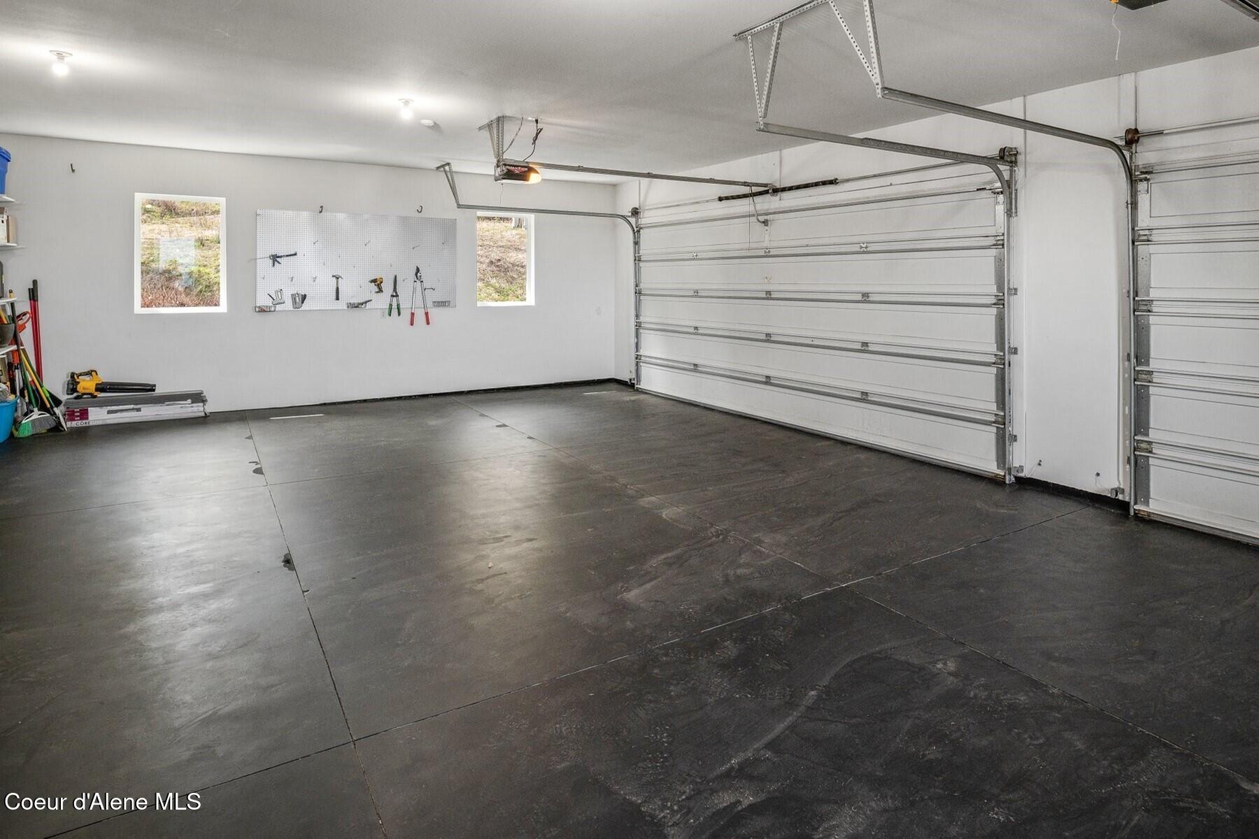 1238 North Reynolds Road Coeur D'Alene, ID 83814 - Photo 40 of 62 3 car garage, epoxy sealed floor