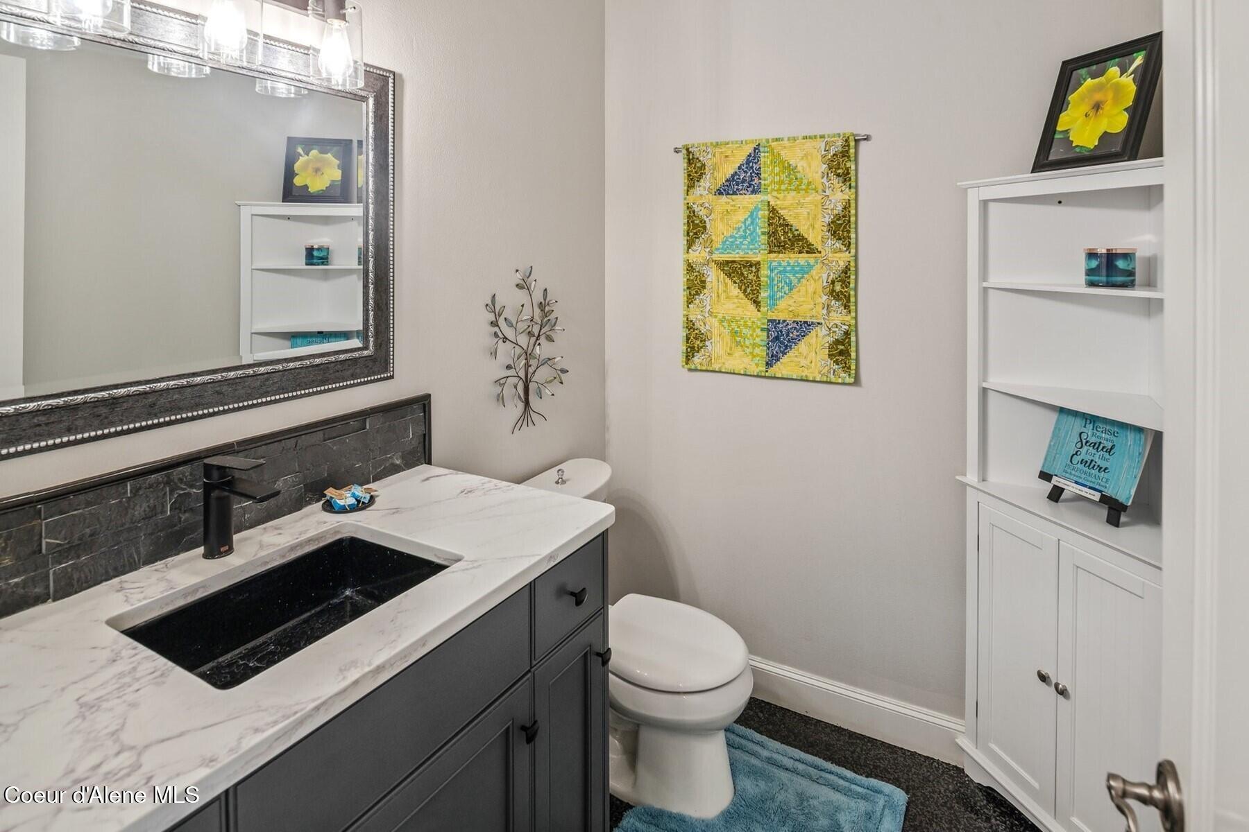 1238 North Reynolds Road Coeur D'Alene, ID 83814 - Photo 52 of 62 Powder room main floor